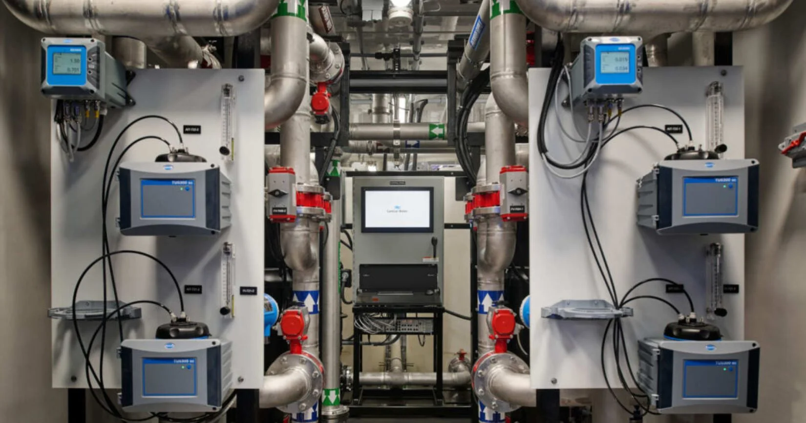 Containerized industrial water treatment system with control panels