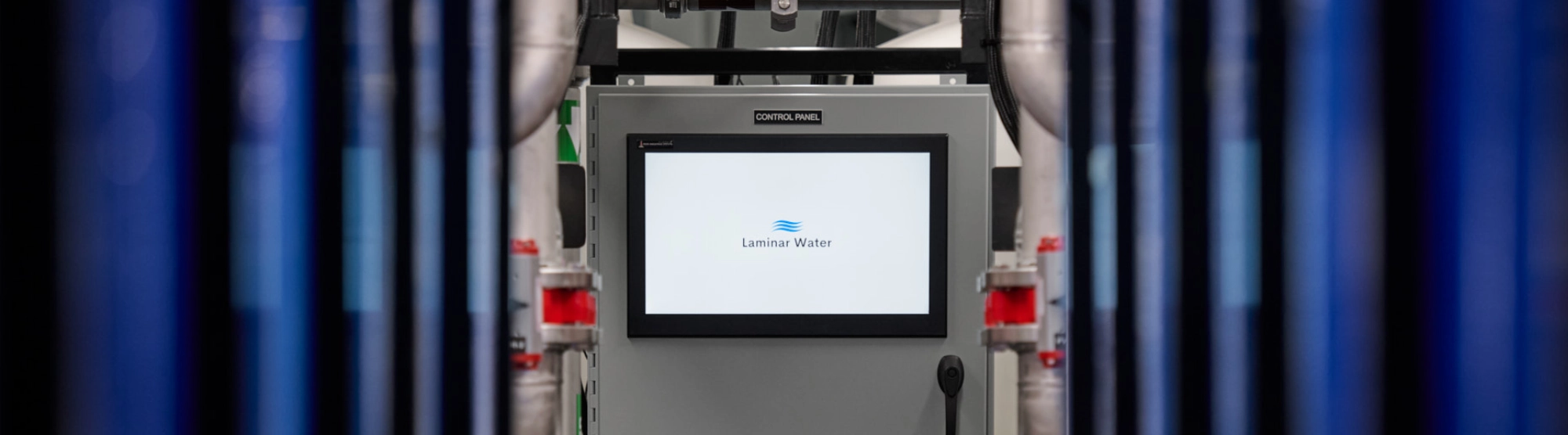 Laminar Water control panel touchscreen inside a mobile water treatment system